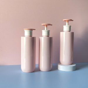 Chai PET Hồng vai ngang vòi nhấn dẹp Hồng