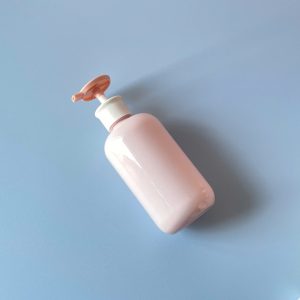 Chai PET Hồng tròn vòi nhấn dẹp Hồng