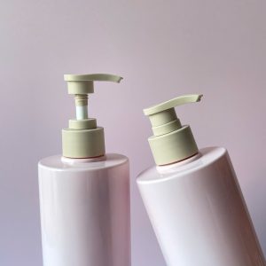 Chai PET hồng vai ngang vòi nhấn sóng nhám nâu
