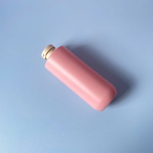 Chai HDPE vai ngang đáy bầu nắp bật nâu