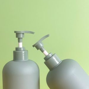 Chai HDPE tròn xanh đậm vòi nhấn sóng xanh trơn